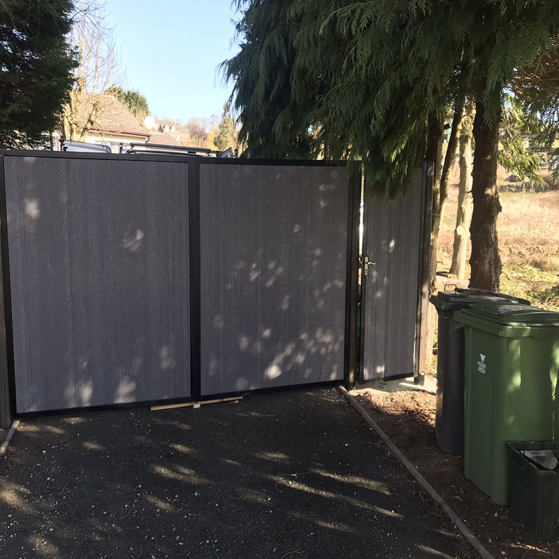 Closed modern double-swing gate with composite panels – SK Welding